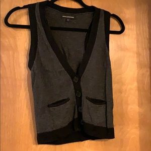 Black and gray buttoned vest